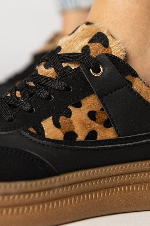 Damen Sneaker mit Pantherdruck aus...