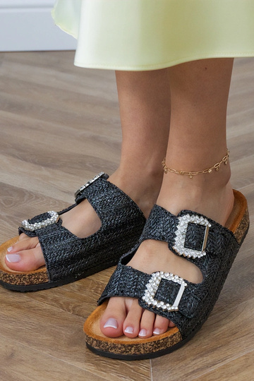 Schwarze Hausschuhe auf... 2