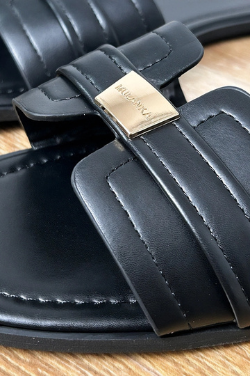 Schwarze Damenpantoletten...