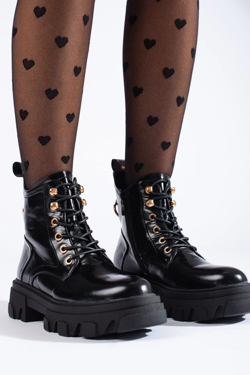 Damenstiefel mit Lackeffekt auf...