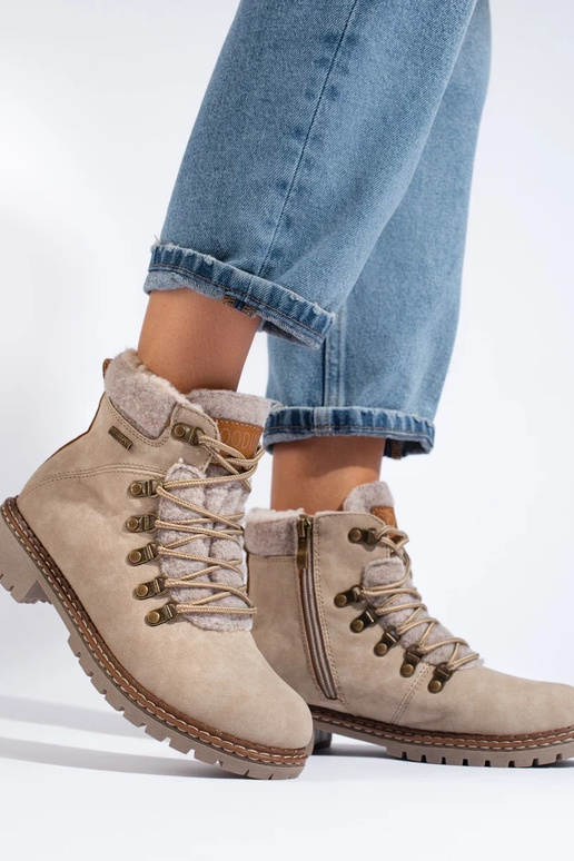 Beige Stiefel mit Schaffellschnürung Beige Stiefel mit Schaffellschnürung