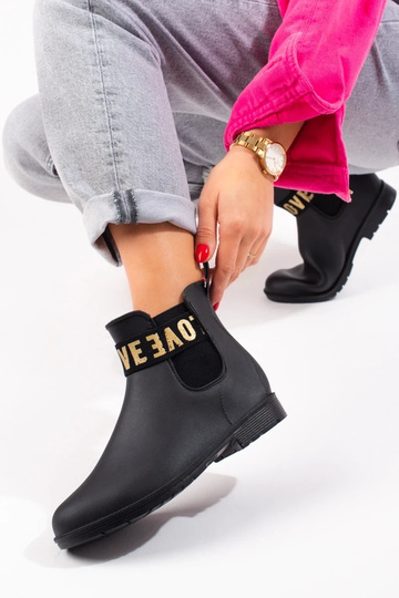 schwarze kurze Gummistiefel... 2