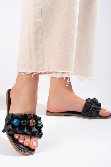 Schwarze Hausschuhe von... 2