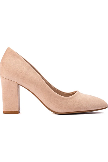 Beige High Heels auf dem...