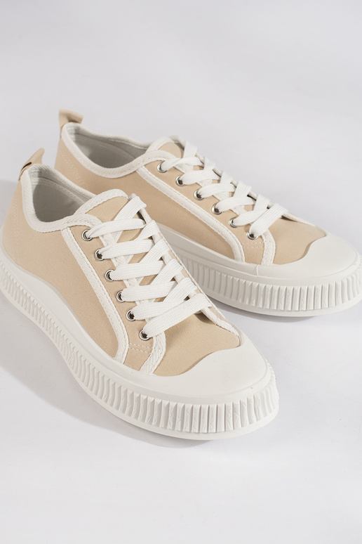 Beigefarbene Sneakers mit Plateau