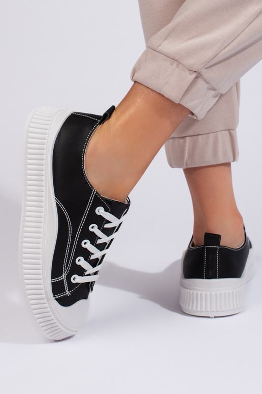 Schwarze klassische Damen-Sneakers... Schwarze klassische Damen-Sneakers...