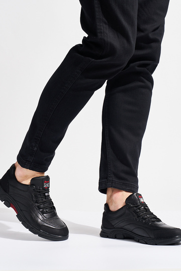 schwarze Sportschuhe für... 2