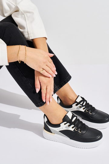 schwarze Sportschuhe mit... 2