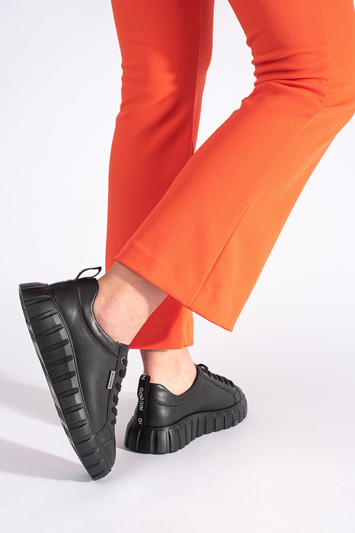 Schwarze Lederstiefeletten mit Plateau