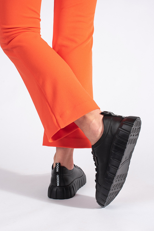 Schwarze Lederstiefeletten mit Plateau