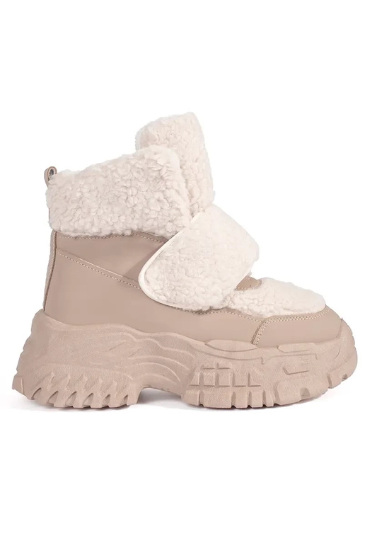 Beige Schneestiefel mit einer... Beige Schneestiefel mit einer...