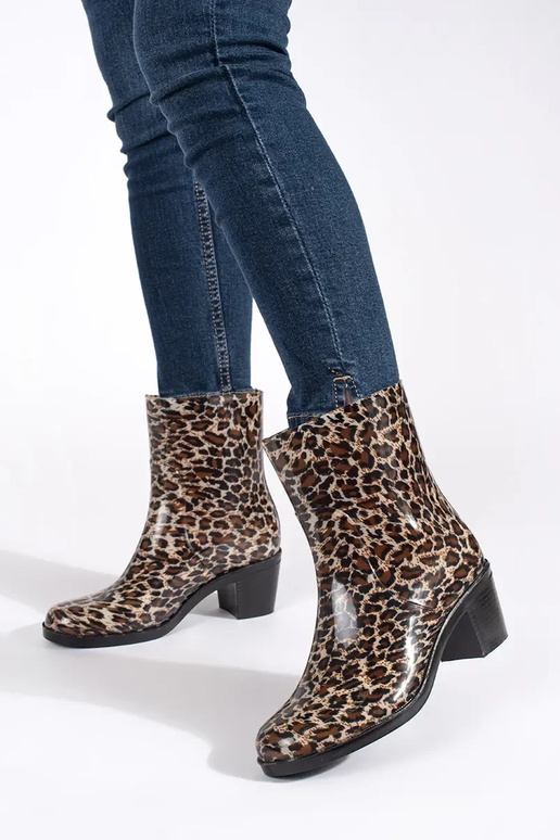 Gummistiefel Frauen auf High Heels...