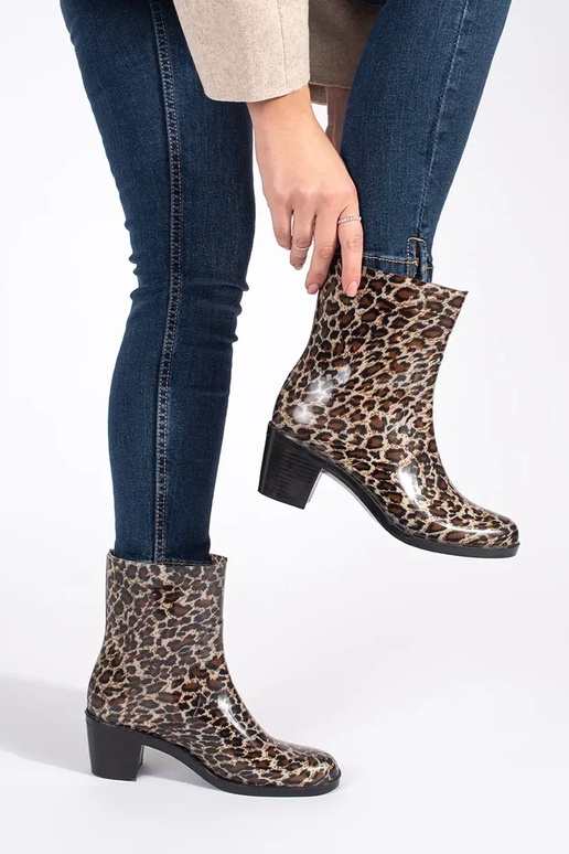 Gummistiefel Frauen auf High Heels...