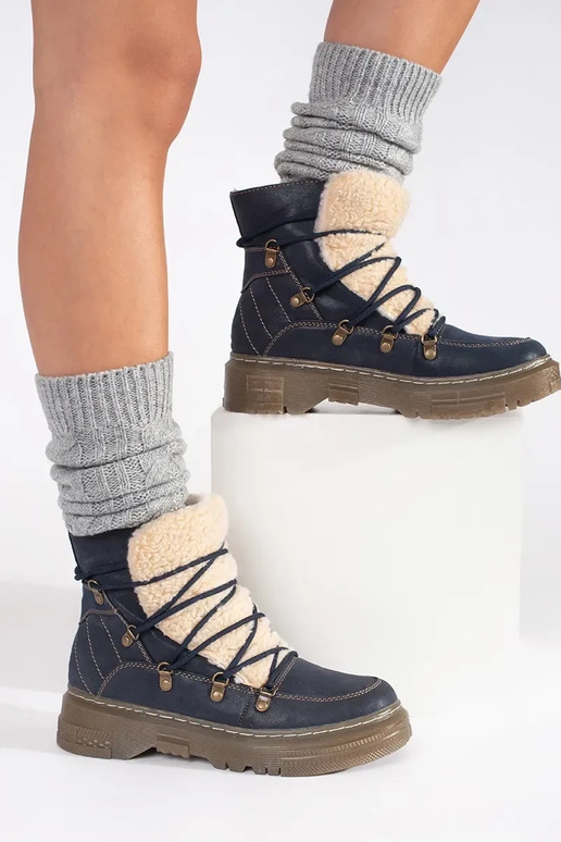 Dunkelblau isolierte Stiefel mit... Dunkelblau isolierte Stiefel mit...