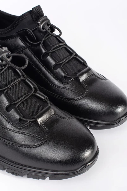 Schwarze flache Sportschuhe Schwarze flache Sportschuhe