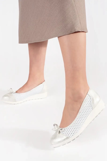 Goldene Mokassins aus... 2