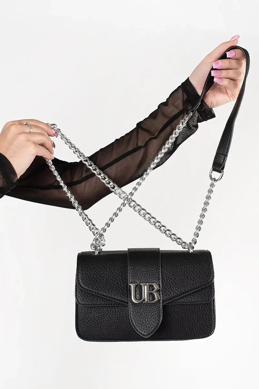 Schwarze kleine Damenhandtasche mit... Schwarze kleine Damenhandtasche mit...