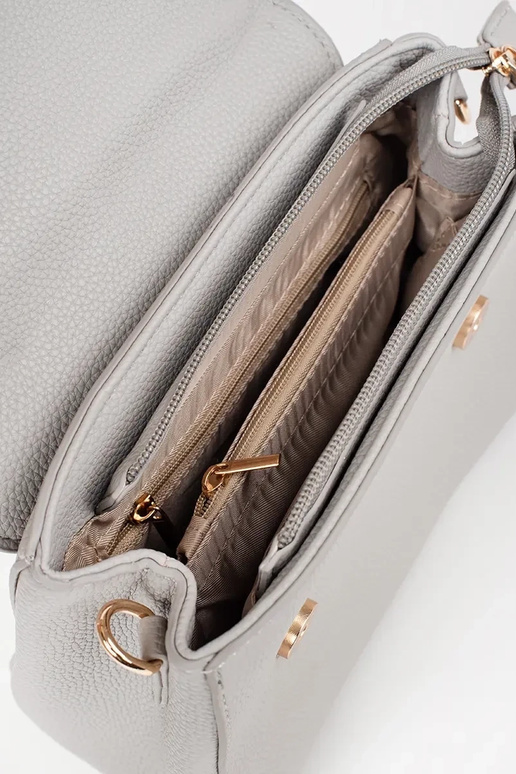 Graue kleine Tasche mit goldenen...