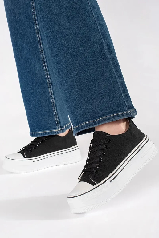 Schwarze klassische Damen-Sneaker auf...