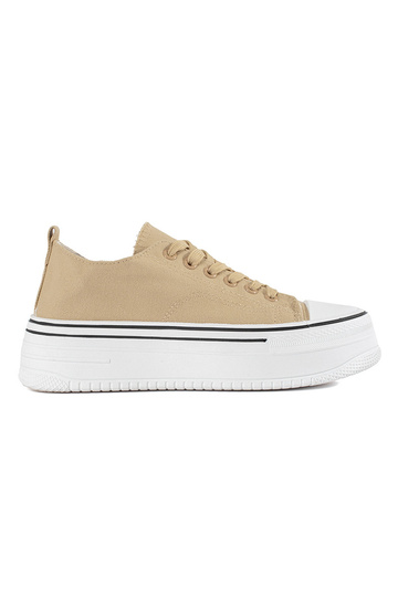 Sandfarbene Sportschuhe mit...
