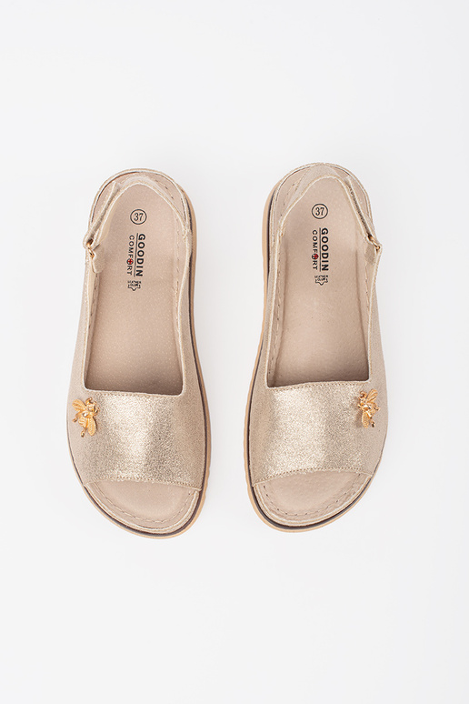 Goldfarbene Sandalen mit Plateau und... Goldfarbene Sandalen mit Plateau und...