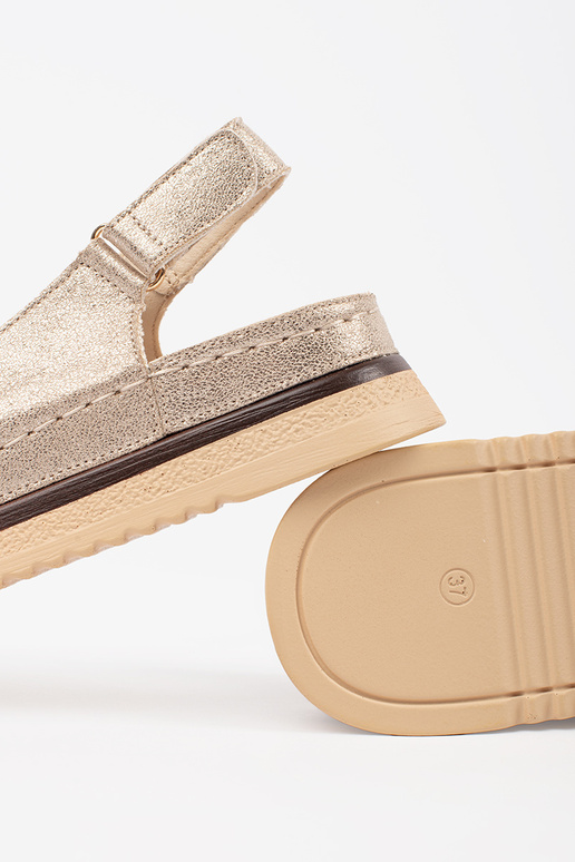 Goldfarbene Sandalen mit Plateau und... Goldfarbene Sandalen mit Plateau und...