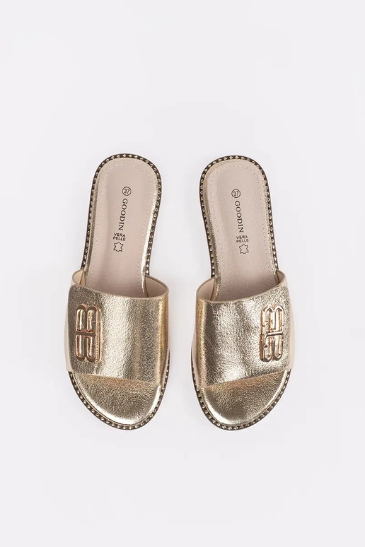 goldene Damenflipflops mit flachem... goldene Damenflipflops mit flachem...
