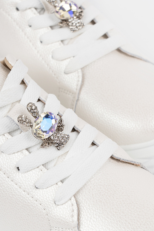 Weiße-silberne Leder-Sport-Schuhe von... Weiße-silberne Leder-Sport-Schuhe von...