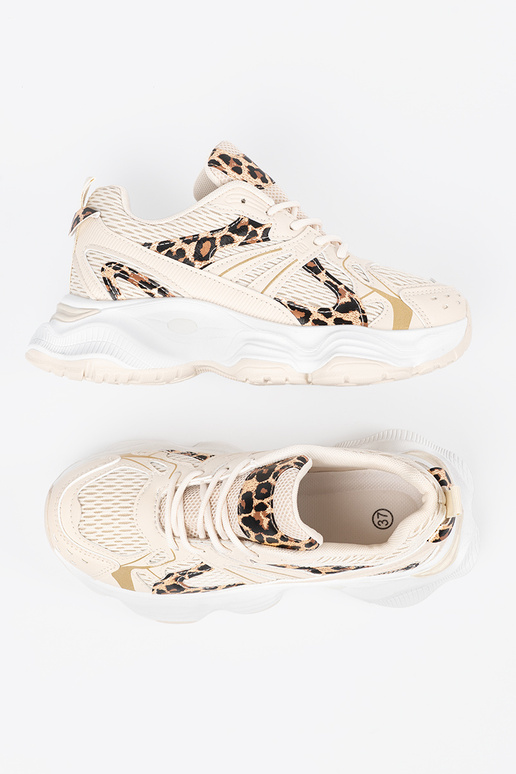 Sandfarbene Sportschuhe im Stil mit...