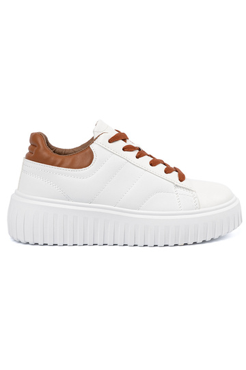 Weiße Sportschuhe im Stil...