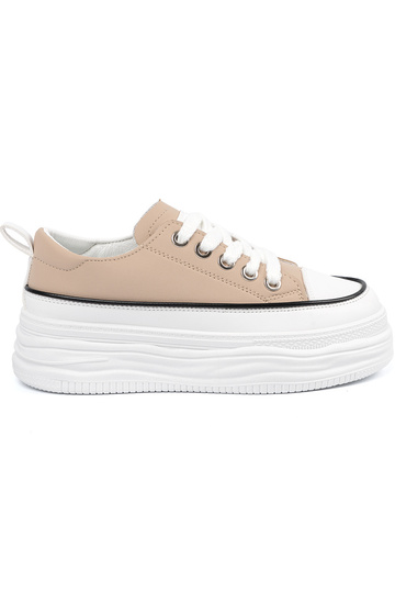 Sandfarbene Sportschuhe mit...