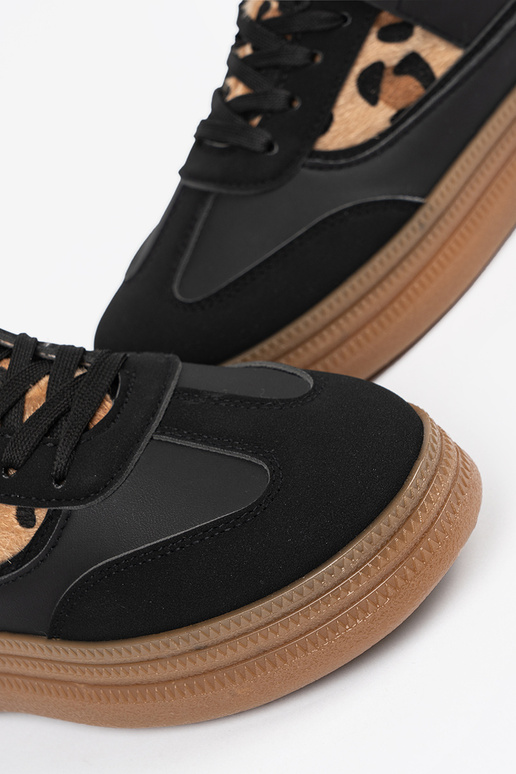 Schwarze sportliche Schuhe für Frauen... Schwarze sportliche Schuhe für Frauen...