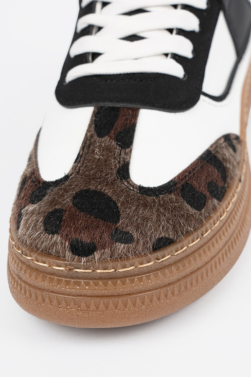 Schwarz-weiße Sportschuhe im...