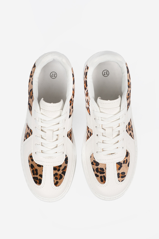 Weiße sportliche Schuhe mit... Weiße sportliche Schuhe mit...