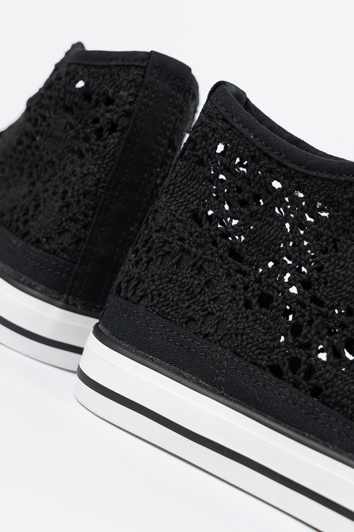 Schwarze hohe Schuhe mit...