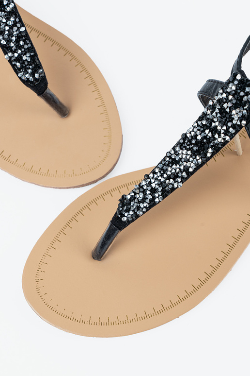 Flache schwarze Sandalen im...