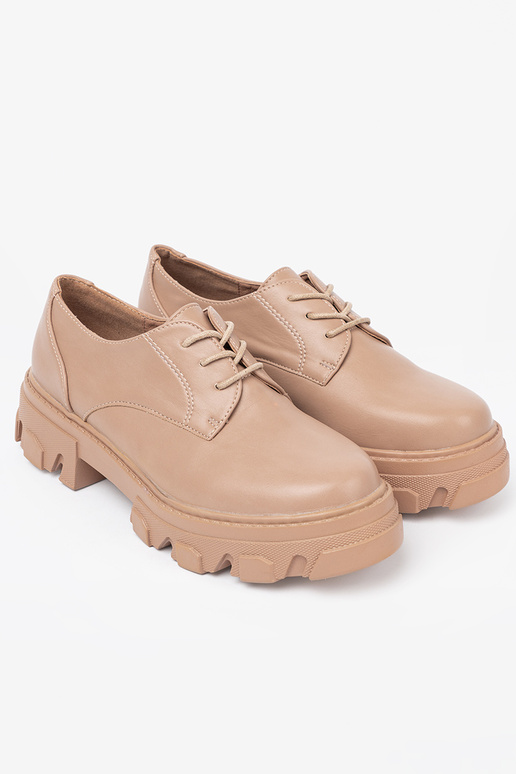Beige gefesselt Halbschuhe mit einer Plattform