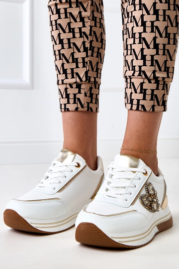 Weiße Sneakers mit...