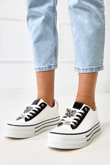 Weiße Sneakers mit...