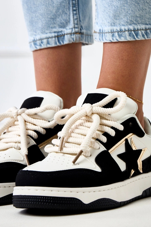 Schwarz-weiße Plattform-Sneaker mit... Schwarz-weiße Plattform-Sneaker mit...