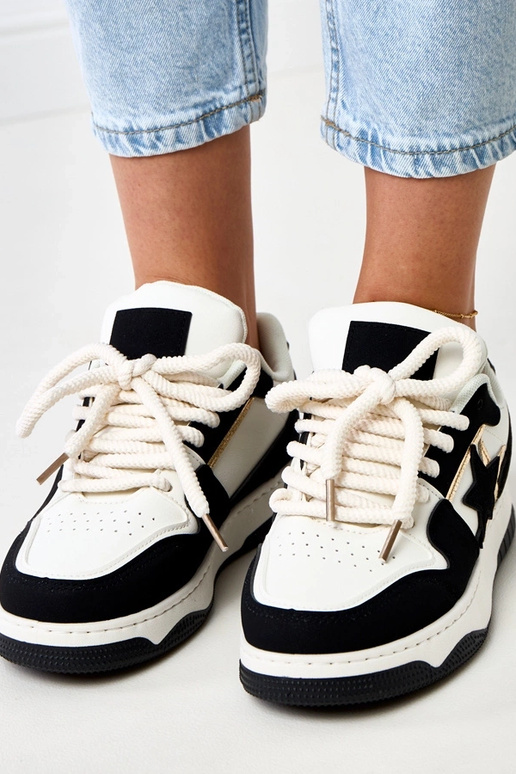 Schwarz-weiße Plattform-Sneaker mit... Schwarz-weiße Plattform-Sneaker mit...