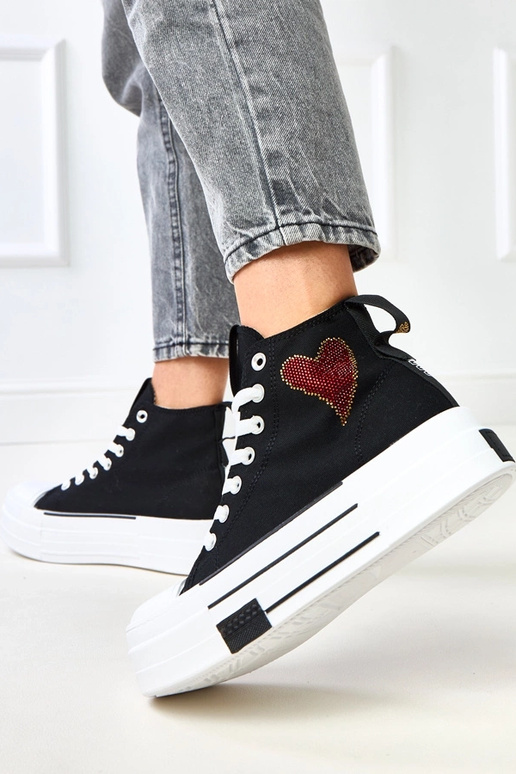 Schwarze hohe Plattform-Sneaker mit... Schwarze hohe Plattform-Sneaker mit...