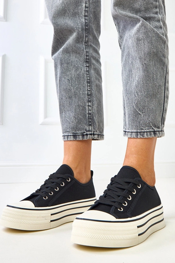 Schwarze Plattform-Sneaker...