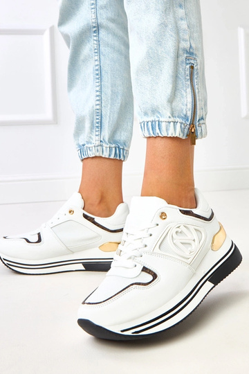 Schwarz-weiße Sneakers auf... 2