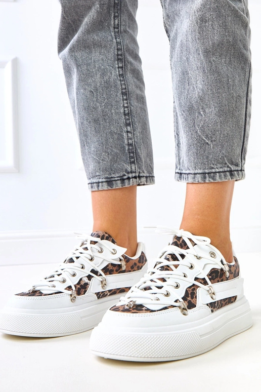 Weiße Sneakers auf Plattform mit... Weiße Sneakers auf Plattform mit...