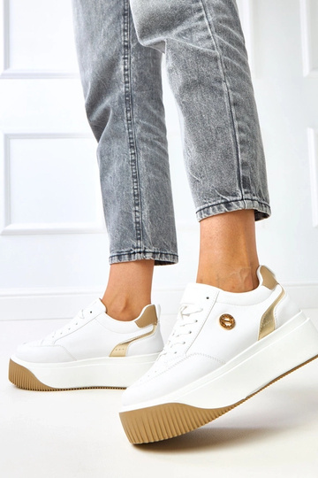 Weiße Sneakers auf... 2