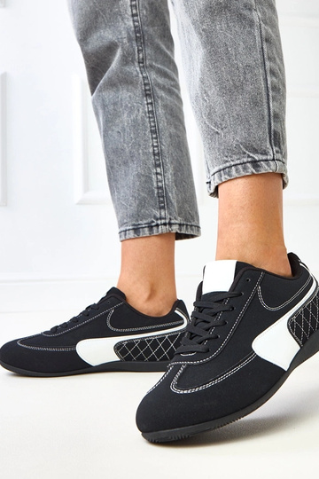 Schwarze Sportschuhe mit... 2