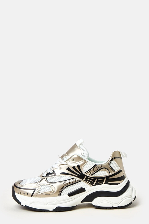 Goldene Sportschuhe auf massivem... Goldene Sportschuhe auf massivem...