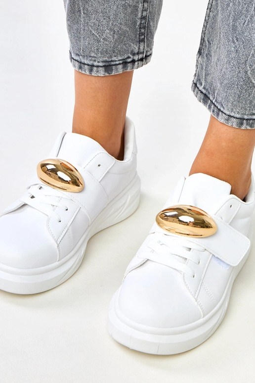 Weiße Plateausneaker mit goldenen... Weiße Plateausneaker mit goldenen...