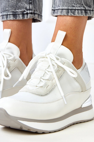 Weiße Sneakers mit... 2